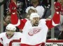 The Wings' Tomas Holmstrom celebrates after scoring during Detroit's 4-1 win over Columbus on Tuesday.(AP Photo/Paul Vernon)