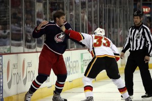Jared Boll and Brandon Prust drop the gloves (Photo by Dave Gainer/The Hockey Writers)