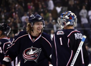 Jakub Voracek and Steve Mason celebrate after a 4-1 victory over the Los Angeles Kings (Dave Gainer/The Hockey Writers)