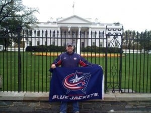 Matt "The Mask" Garrett carries the flag outside The White House. (Photo by Matt Garrett)