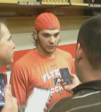 Dan Carcillo speaks to the media following the game on 10/1 (J. Johnson/THW)