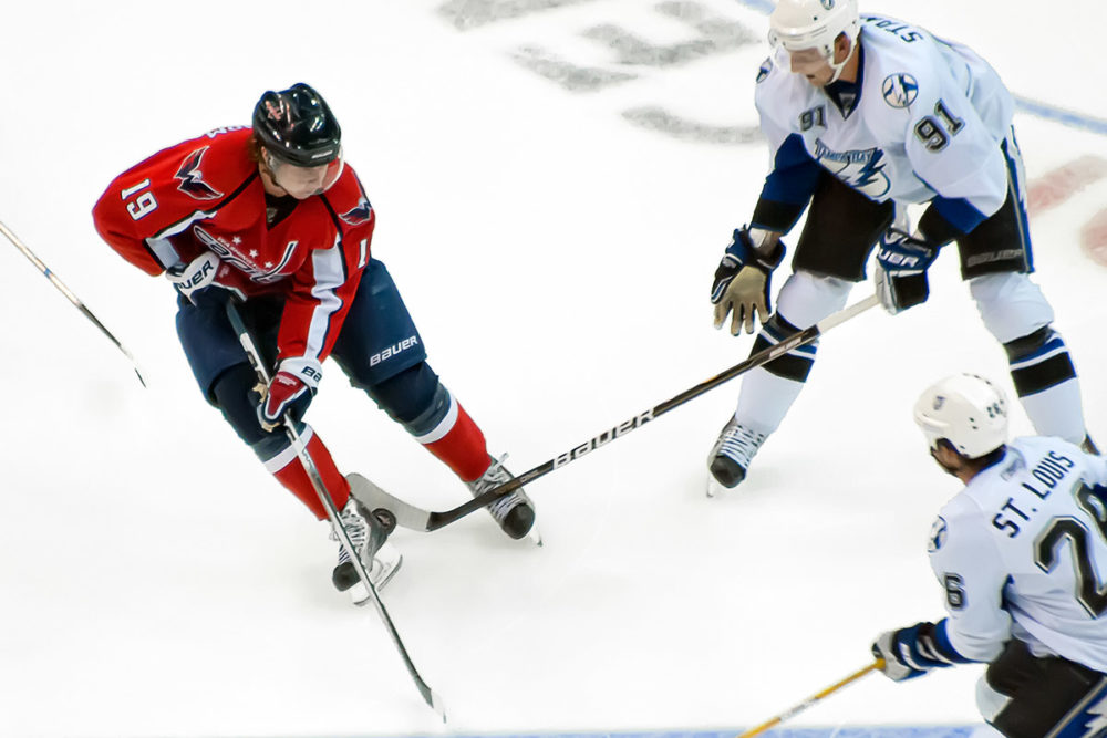 Backstrom and Stamkos Battle for the Puck (Clydeorama/Photoree)
