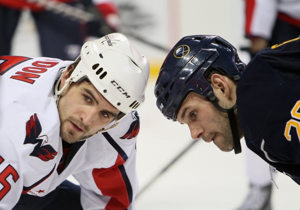 Boyd Gordon (left) is a wizard in the faceoff circle (Icon SMI)