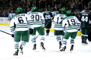 UND Heads off the ice after a goal against BSU. (Photo Credit: Russell Hons UNDSports.com)