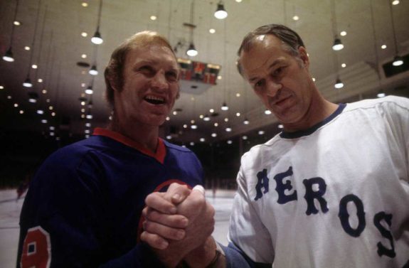Bobby Hull #9 of the Winnipeg Jets and Gordie Howe #9 of the Houston Aeros
