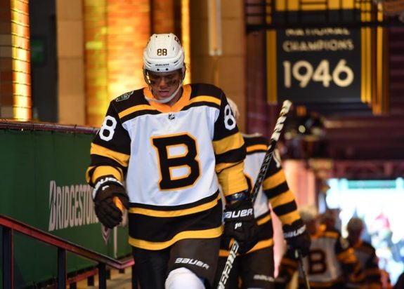 what does the a on the bruins jersey mean