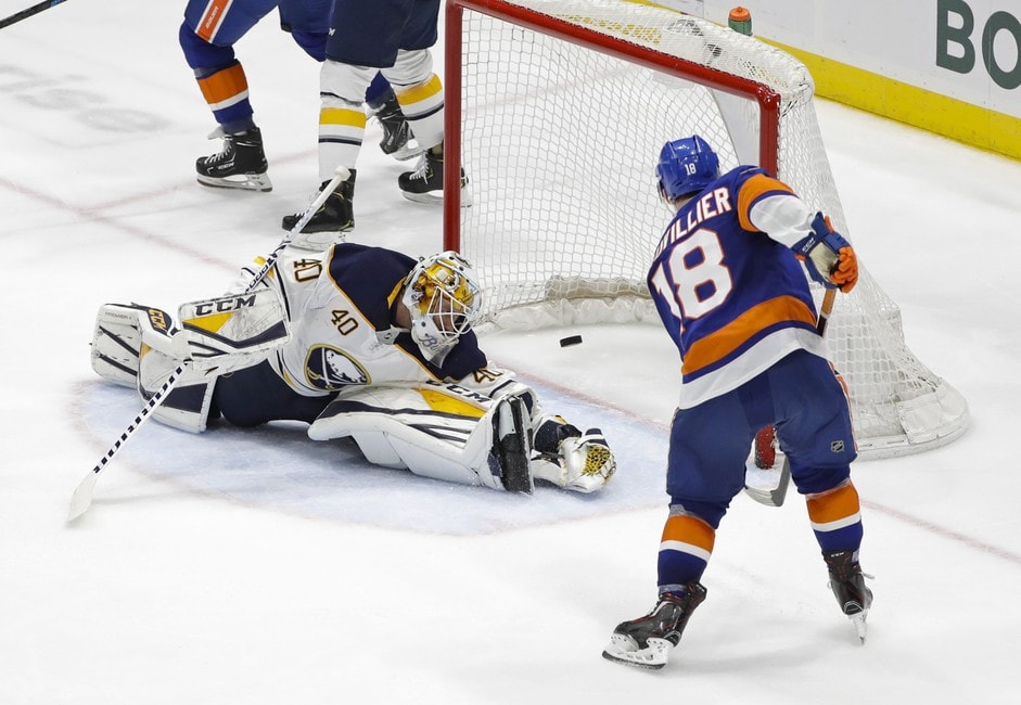 Carter Hutton of the Buffalo Sabres, Anthony Beauvillier of the New York Islanders