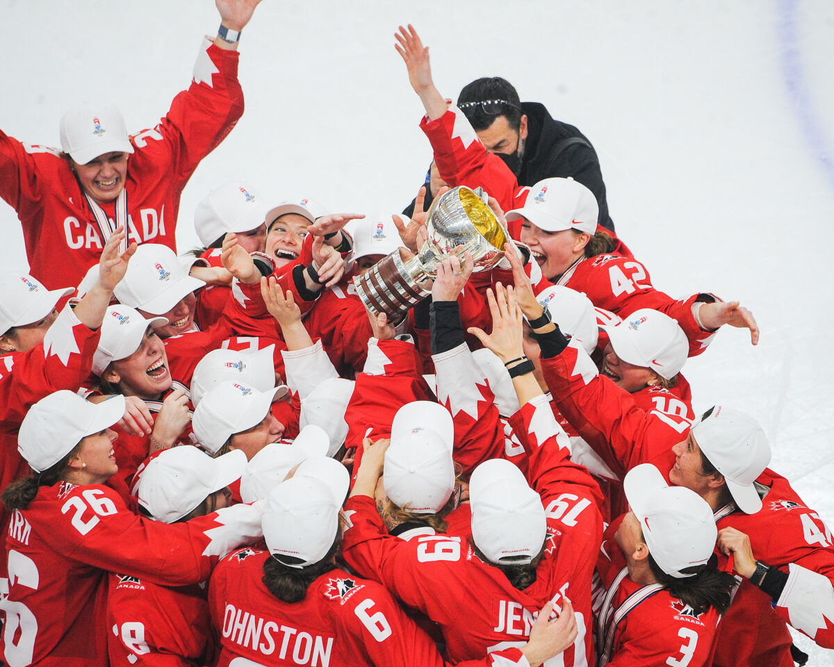 Team Canada celebrates after winning gold at the 2021 IIHF Women's World Championship