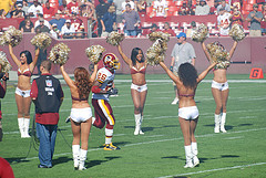 Redskins Clinton Portis 'Runs The Gauntlet' Of Cheerleaders {Photo: Flickr - C&R Dunn}