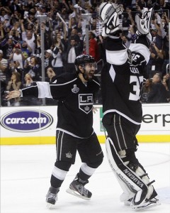Drew Doughty celebrates with goaltender Jonathan Quick after winning the Stanley Cup. (Jerry Lai-US PRESSWIRE)
