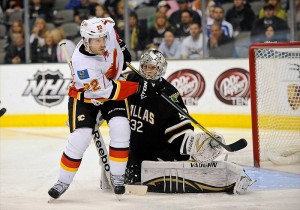 Mar 24, 2012; Dallas, TX, USA; Calgary Flames right wing Lee Stempniak (22) redirects a shot on Dallas Stars goalie Kari Lehtonen (32) during the game at the American Airlines Center. The Stars defeated the Flames 4-1. (Jerome Miron-USA TODAY Sports)