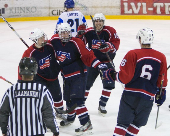 Team USA coming together to celebrate a goal against Team Finland in the bronze medal game. (Photo Courtesy of Maureen Lingle)