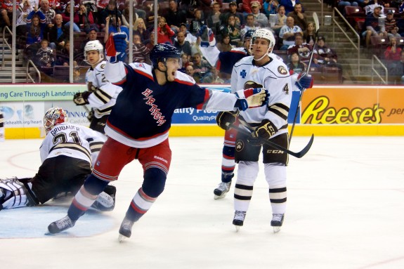 Hartford celebrates after a goal by the Wolf Pack. (Annie Erling Gofus/The Hockey Writers)