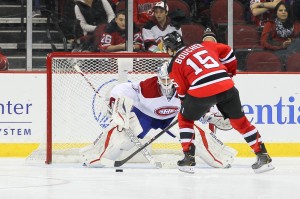 Reid Boucher scores the New Jersey Devils first shootout goal of the 2013-14 season against Peter Budaj (Ed Mulholland-USA TODAY Sports)