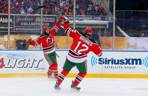 Patrik Elias & Damien Brunner celebrate a goal during the first period. (Ed Mulholland-USA TODAY Sports)