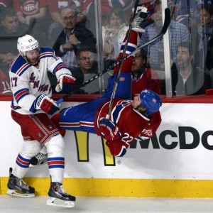 Montreal Canadiens forward Dale Weise and former-New York Rangers defenseman John Moore