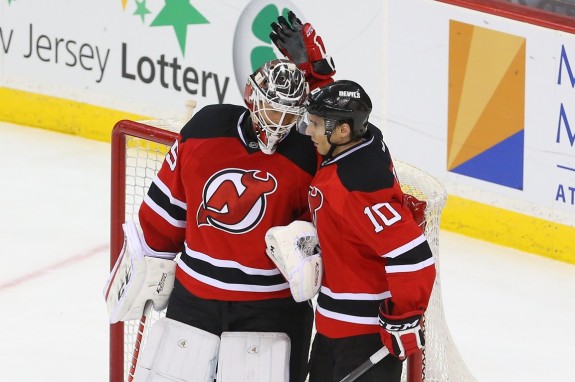 Cory Schneider hopes to celebrate a few more wins this season. (Ed Mulholland-USA TODAY Sports)