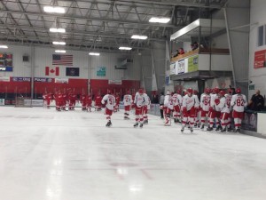 The teams take the ice to start the annual prospect scrimmage game. (Photo: Zackary Landers) 