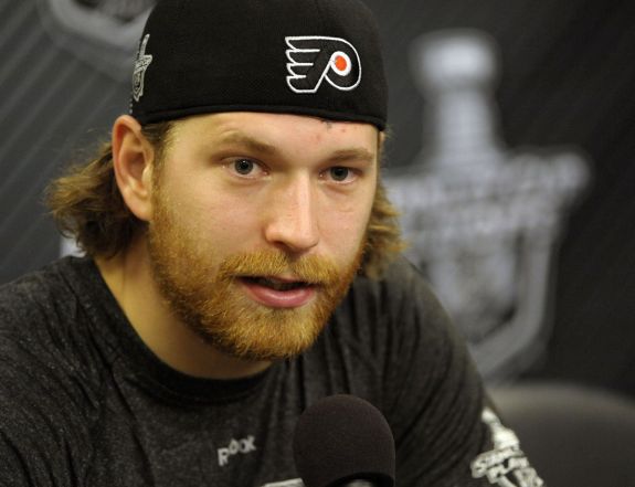 Choosing a captain is hardly exclusive to skill on the ice. Like Flyers captain Claude Giroux (above), they're responsible for answering to multiple outlets for their team's performance.