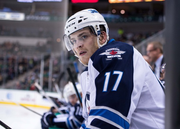 (Jerome Miron-USA TODAY Sports) Adam Lowry is following in his father Dave's footsteps as an NHL player and will make his playoff debut for the Winnipeg Jets this week when they take on the Anaheim Ducks in a first-round series.