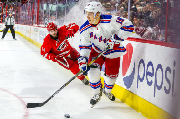 Carolina Hurricanes left wing Nathan Gerbe (14) and New York Rangers right wing Jesper Fast (19) (Photo Credit: Andy Martin Jr)