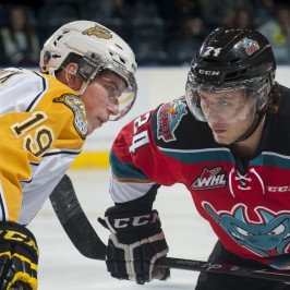 (Marissa Baecker/www.shootthebreeze.ca)Nolan Patrick of the Brandon Wheat Kings, left, faces off against Tyson Baillie of the Kelowna Rockets during WHL regular-season action in Kelowna on Oct. 25. The Rockets won 6-1 in the only meeting to date between the two teams, but the Wheat Kings will host Game 1 of the WHL championship series in Brandon tonight.