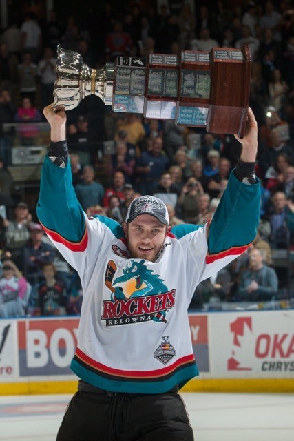 (Marissa Baecker/Shoot The Breeze) Leon Draisaitl lifts the Ed Chynoweth Cup over his head in celebration of winning the WHL championship with the Kelowna Rockets.