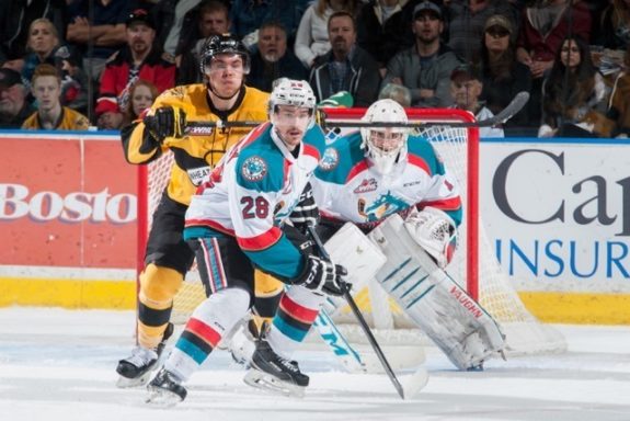 (Marissa Baecker/Shoot The Breeze) Kelowna Rockets goaltender Jackson Whistle watches for an incoming shot while Joe Gatenby (28) defends against the Brandon Wheat Kings in the WHL final.