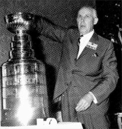 Clarence Campbell draws the order of selection for the expansion draft.
