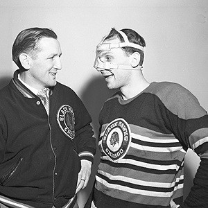 Hawks coach Sid Abel with Gus Mortson, who played through many injuries.