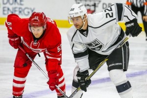 Trevor Lewis (22) has shown excellent chemistry with Brown.