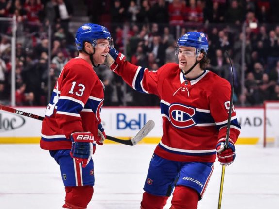 Max Domi #13 of the Montreal Canadiens celebrates a second period goal with teammate Jonathan Drouin