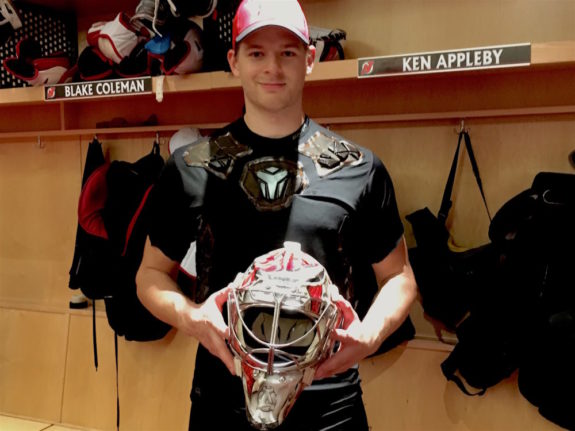 Ken Appleby poses with his mask after Devils Development Camp (Dan Rice/THW)