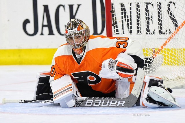 (Amy Irvin/The Hockey Writers) Philadelphia Flyers goaltender Michal Neuvirth is leading the NHL in save percentage at .937 through 17 appearances and 960 minutes of action this season, but is he the starter or the backup going forward?