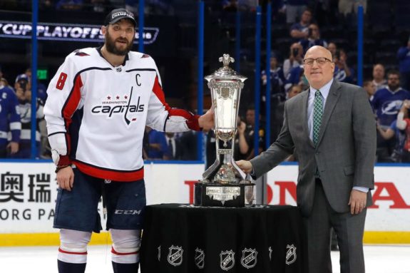 Alex Ovechkin #8 of the Washington Capitals and NHL Deputy Commissioner Bill Daly
