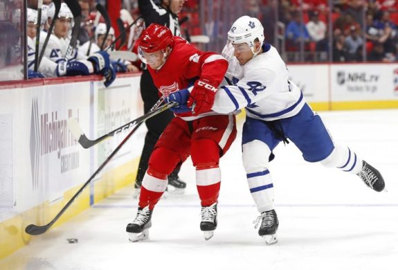 Toronto Maple Leafs left wing Trevor Moore and Detroit Red Wings defenseman Joe Hicketts