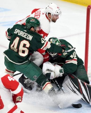 Detroit Red Wings' Luke Glendening Minnesota Wild Jared Spurgeon Devan Dubnyk