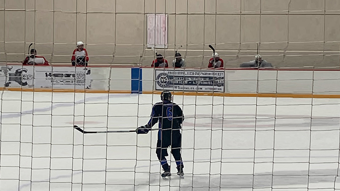 The author on the ice at his beer league game.