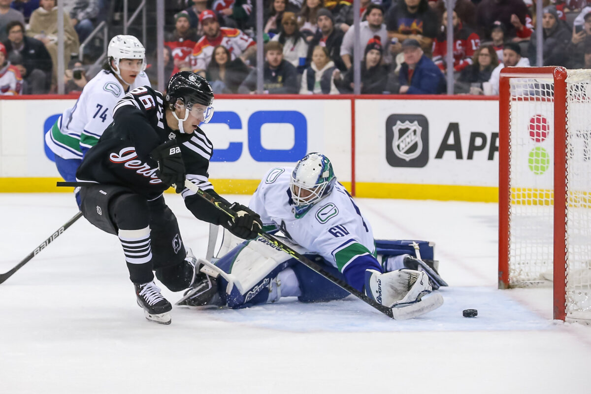 Jack Hughes New Jersey Devils Collin Delia Vancouver Canucks