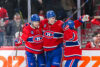 Juraj Slafkovsky Nick Suzuki Cole Caufield Montreal Canadiens