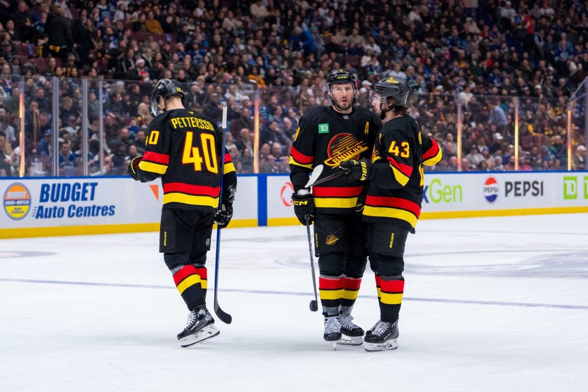 Quinn Hughes JT Miller Elias Pettersson Vancouver Canucks